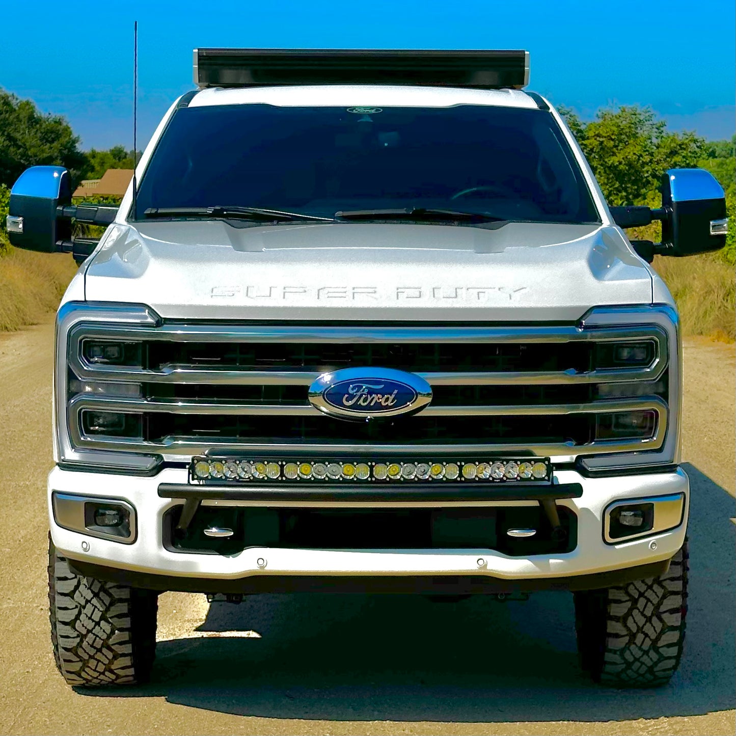 2017 - 2024 Ford Super Duty Light Mount - The "Low Pro" Series featuring a Baja Designs 40" Curved OnX6 Arc Mount Tabs