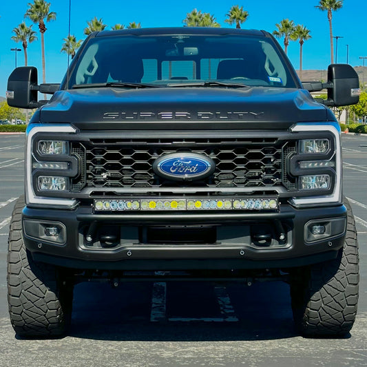 2017 - 2025  Ford Super Duty Light Mount - The "Low Pro" Series featuring a Baja Designs 40" Curved OnX6 Arc Mount Tabs