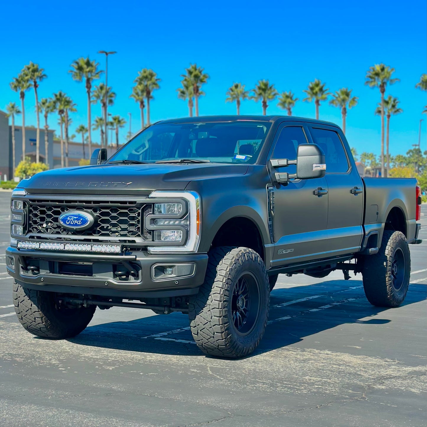 2017 - 2024 Ford Super Duty Light Mount - The "Low Pro" Series featuring a Baja Designs 40" Curved OnX6 Arc Mount Tabs