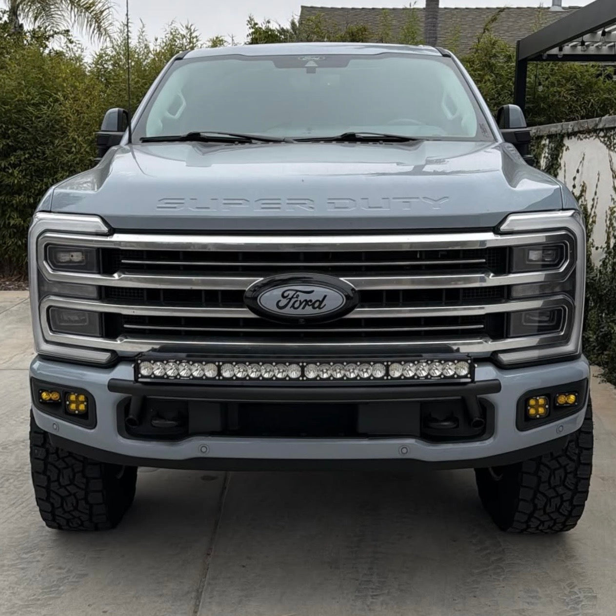 2017 -2026  Ford Super Duty Light Mount - The "Low Pro" Series featuring a Baja Designs 40" Curved OnX6 Arc Mount Tabs